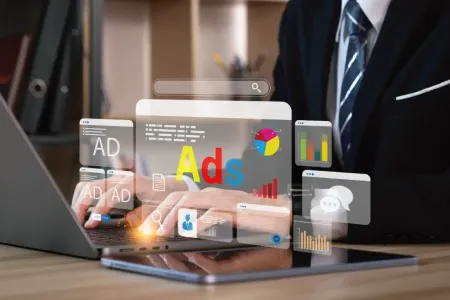 man-typing-into-computer