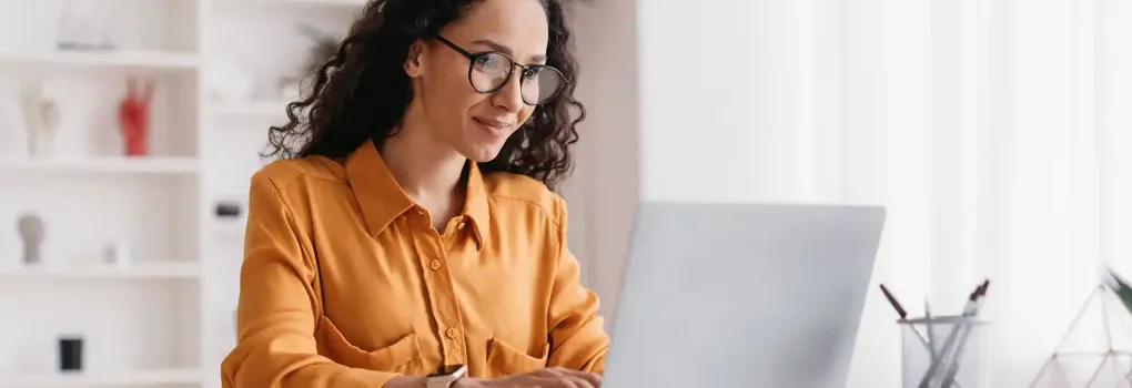woman on laptop at desk