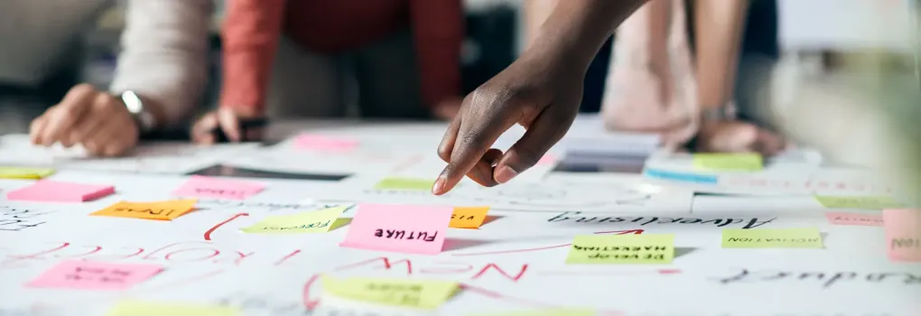 team brainstorming sticky notes