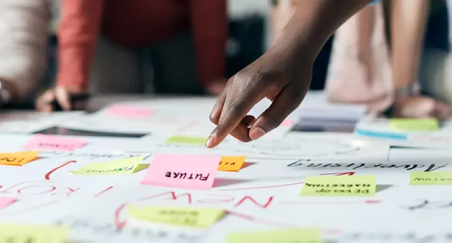 team brainstorming sticky notes