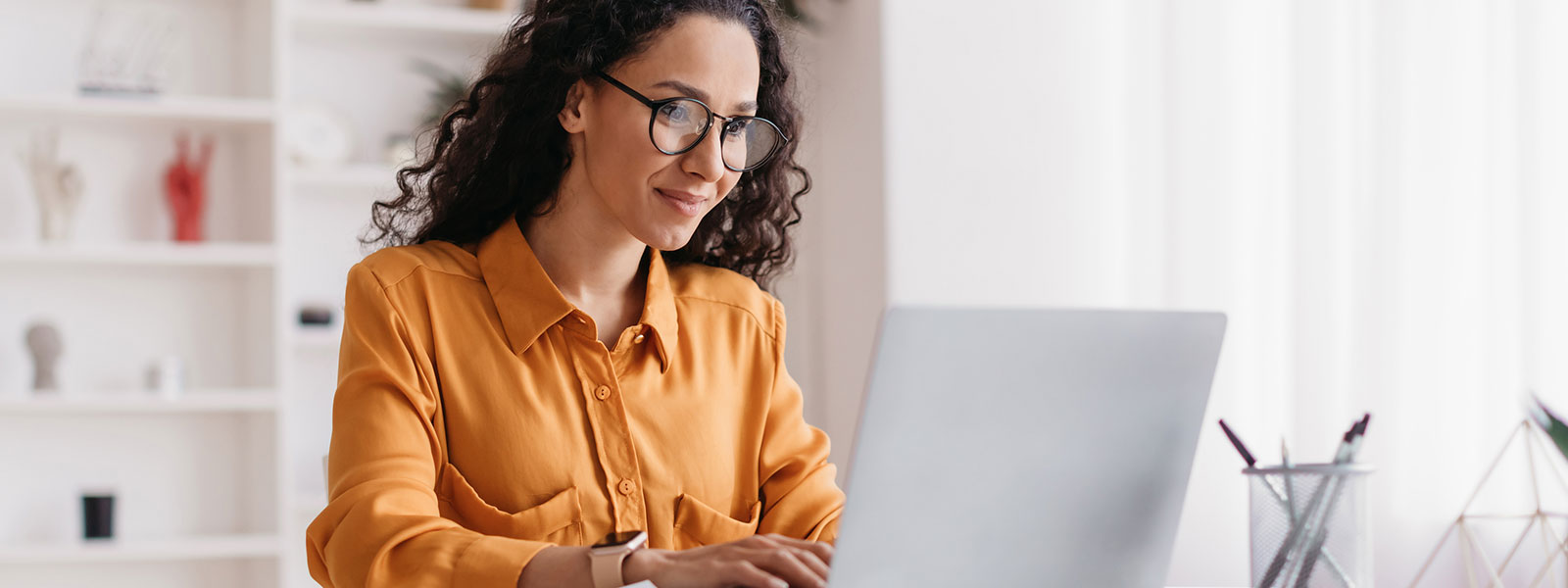 woman looking at laptop