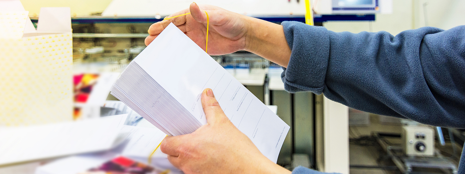 a man printing flyers