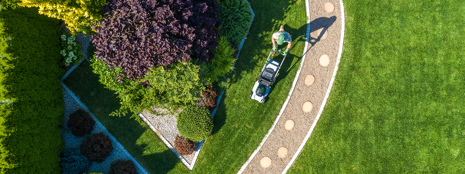 man mowing a lawn