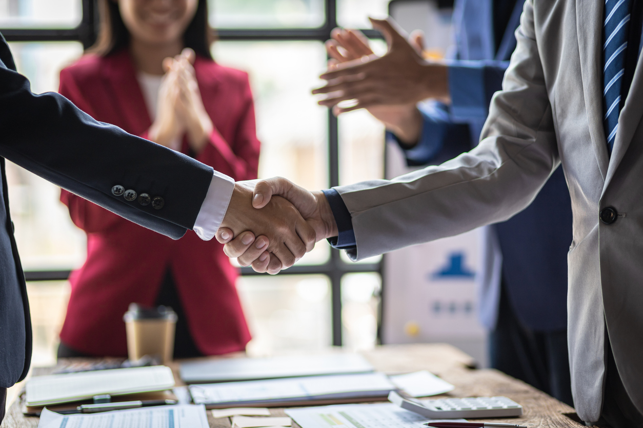 business people shaking hands