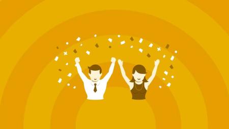 Two people celebrating with their hands up.